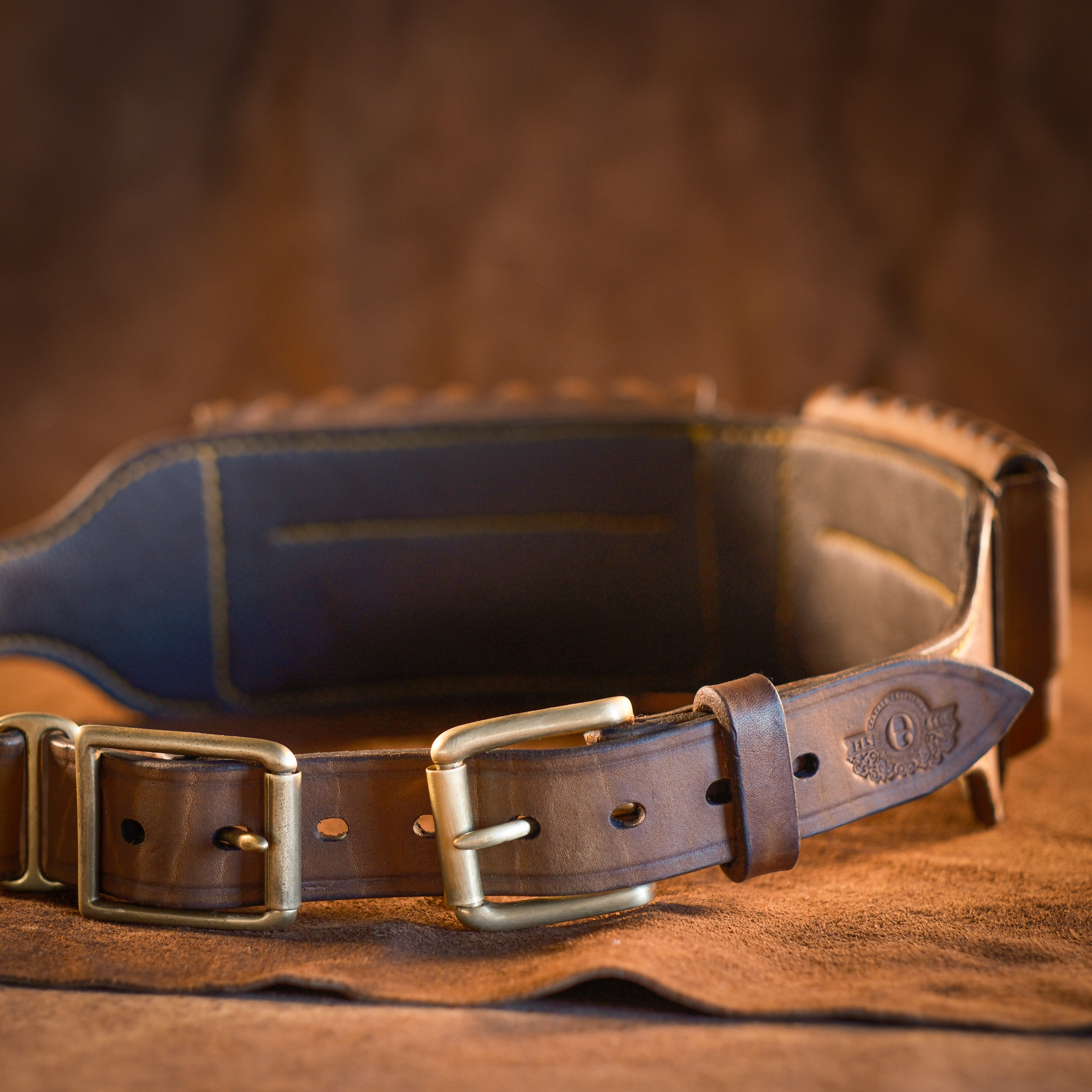 Cartridge loops, stitched to the belt by hand.